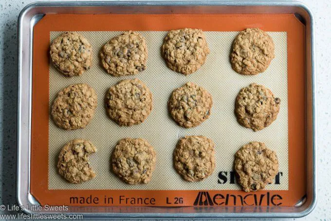 Oatmeal Raisin Cranberry Cookies cooling on a sheet