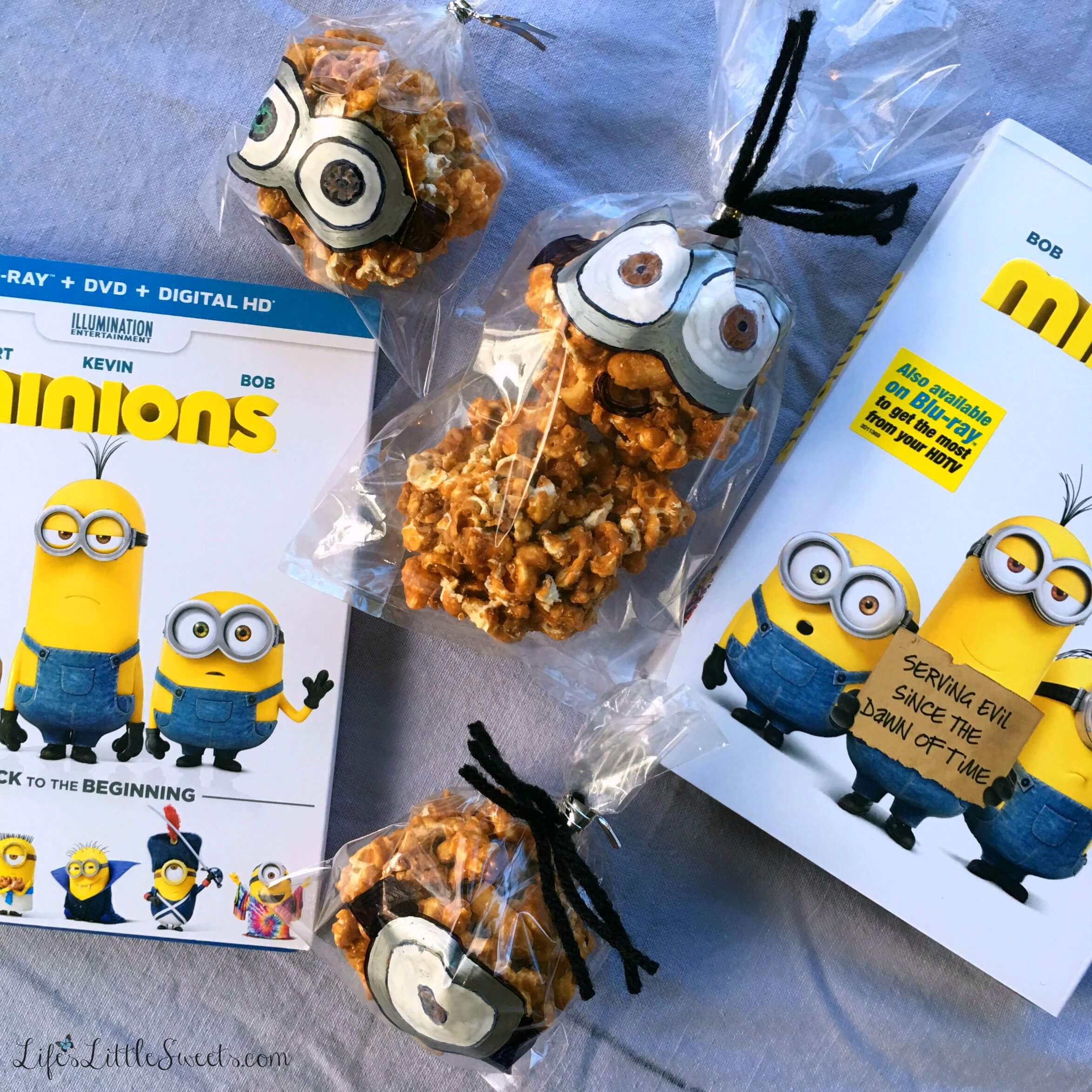 Halloween Recipes - This easy and simple Caramel Popcorn Balls recipe has only 4 ingredients including homemade Dutch Oven Popcorn! Check out my full tutorial on illustrating the treat bags for the Caramel Popcorn Balls just like the Minions movie characters “Stuart,” “Kevin” and “Bob” within this post! Enjoy these Caramel Popcorn Balls during your #MinionsMovieNight! #MinionsMovieNight #ad #CollectiveBias