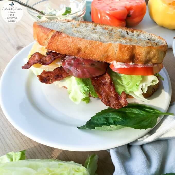 This Rustic BLT Sandwich is an ode to the the classic BLT with a rustic twist. It has homemade, no-knead bread, heirloom tomatoes, savory Applewood smoked bacon, crisp Iceberg lettuce and basil mayonnaise. This Rustic BLT Sandwich with its emphasis on whole ingredients and delicious flavor is inspired by DISH from Rachael Ray™ Nutrish®. #ad #MyNutrishDish #CollectiveBias