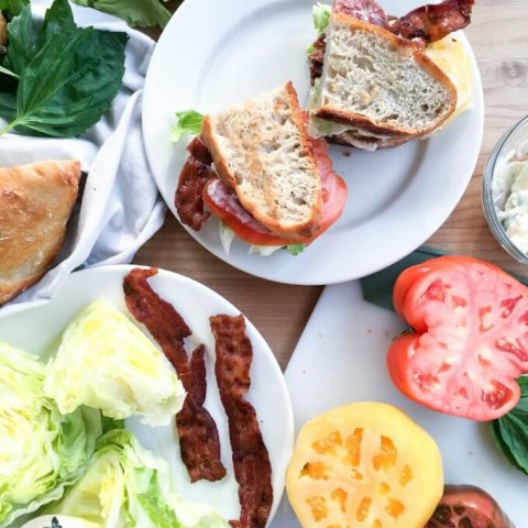 This Rustic BLT Sandwich is an ode to the the classic BLT with a rustic twist. It has homemade, no-knead bread, heirloom tomatoes, savory Applewood smoked bacon, crisp Iceberg lettuce and basil mayonnaise. This Rustic BLT Sandwich with its emphasis on whole ingredients and delicious flavor is inspired by DISH from Rachael Ray™ Nutrish®.
