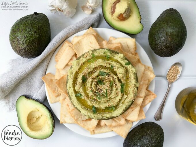 With 7 ingredients or less, this Avocado Hummus recipe is easy to whip up in minutes. Topped with sesame seeds and fresh cilantro, let this be your new favorite appetizer or party snack! Check out the entire #FoodieMamas recipe round up featuring avocados.