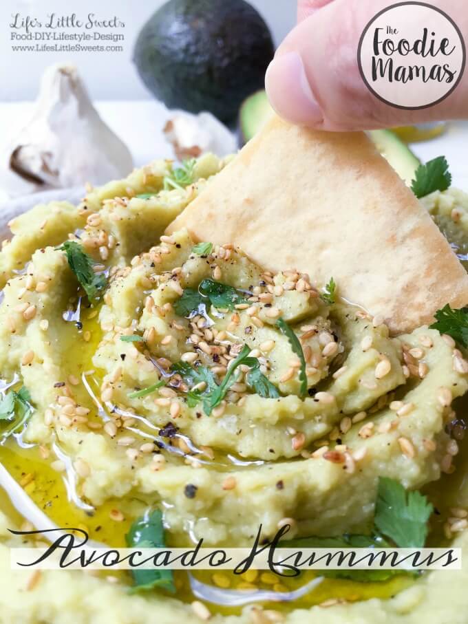 14 Healthy Recipes + 2 Bonus Recipes! | With 7 ingredients or less, this Avocado Hummus recipe is easy to whip up in minutes. Topped with sesame seeds and fresh cilantro, let this be your new favorite appetizer or party snack! Check out the entire #FoodieMamas recipe round up featuring avocados.