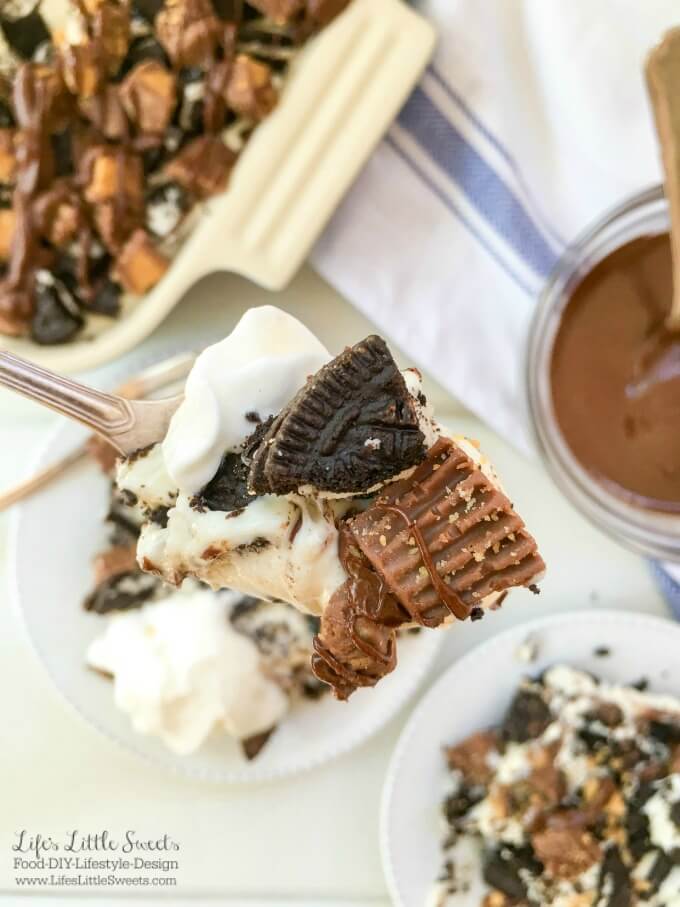 ? This One-Pan Peanut Butter Cup Oreo No Bake Cheesecake combines cheesecake with Oreo cookies and Reese's Peanut Butter Cups to create a decadent dessert! Bring this rich and creamy, no bake, layered dessert to your next gathering for everyone to enjoy.