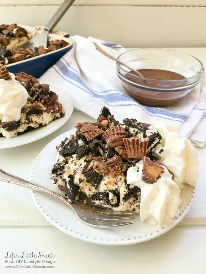 ? This One-Pan Peanut Butter Cup Oreo No Bake Cheesecake combines cheesecake with Oreo cookies and Reese's Peanut Butter Cups to create a decadent dessert! Bring this rich and creamy, no bake, layered dessert to your next gathering for everyone to enjoy.