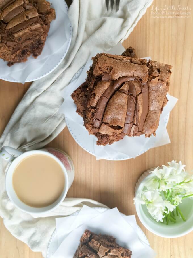 ? These Chocolate Nutella Brownies are one of my all time favorite brownie recipes with 3 kinds of chocolate in them. They are the perfect partner to a hot mug of coffee or tea or a tall glass of milk. Cure your chocolate craving with these incredible, fudgy brownies!