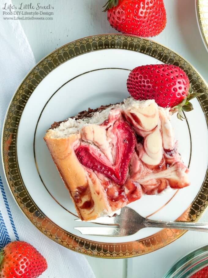 brownie-bottom-marbled-strawberry-cheesecake-www-lifeslittlesweets-com-recipe-walmart-smuckers-fruit-honey-spread-ad-680x907-close-up-slice-vertical