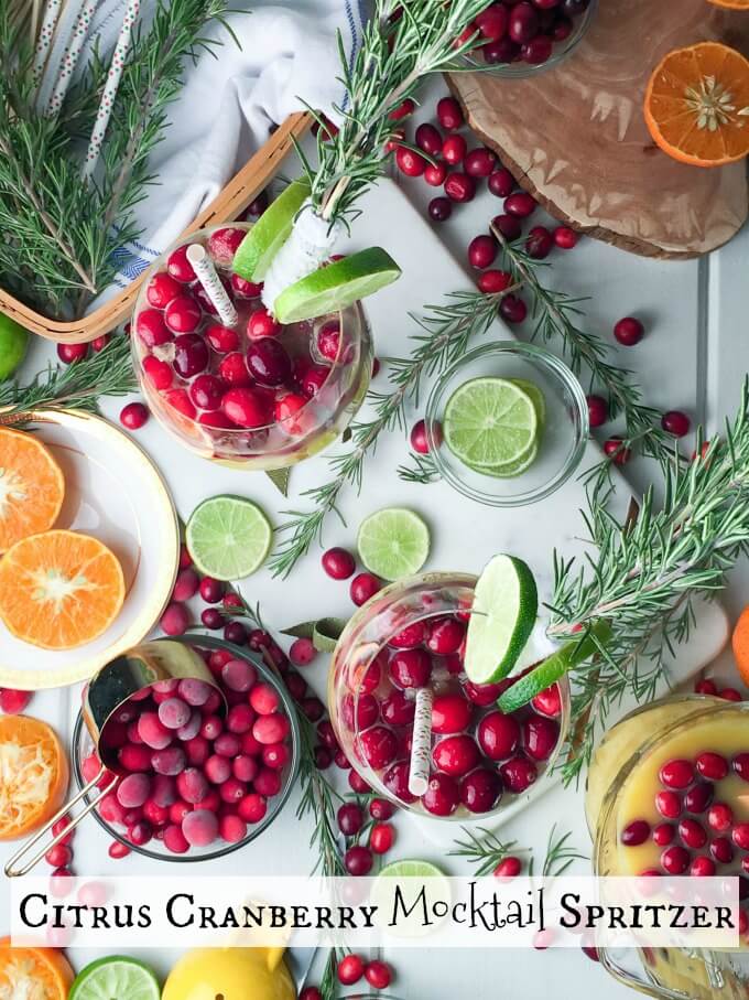 ?This Citrus Cranberry Mocktail Spritzer Recipe is so light, citrus-y and delicious complete with a holiday flair decoration! It is sure to delight ALL your senses at your next holiday gathering! Check out my FIRST Facebook Live video! #SoFabFood #ad
