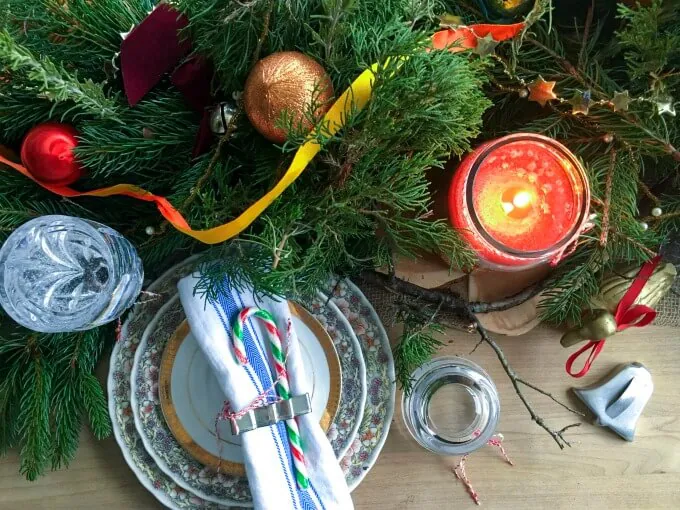 DIY Holiday Table Centerpiece - This DIY Holiday Table Centerpiece is a resourceful and easy craft to prepare. Do make this festive DIY, just use evergreen tree trimmings from your yard, ribbon, ornaments and aromatic American Home™ by Yankee Candle® candles! #LoveAmericanHome #cbias #ad #CollectiveBias