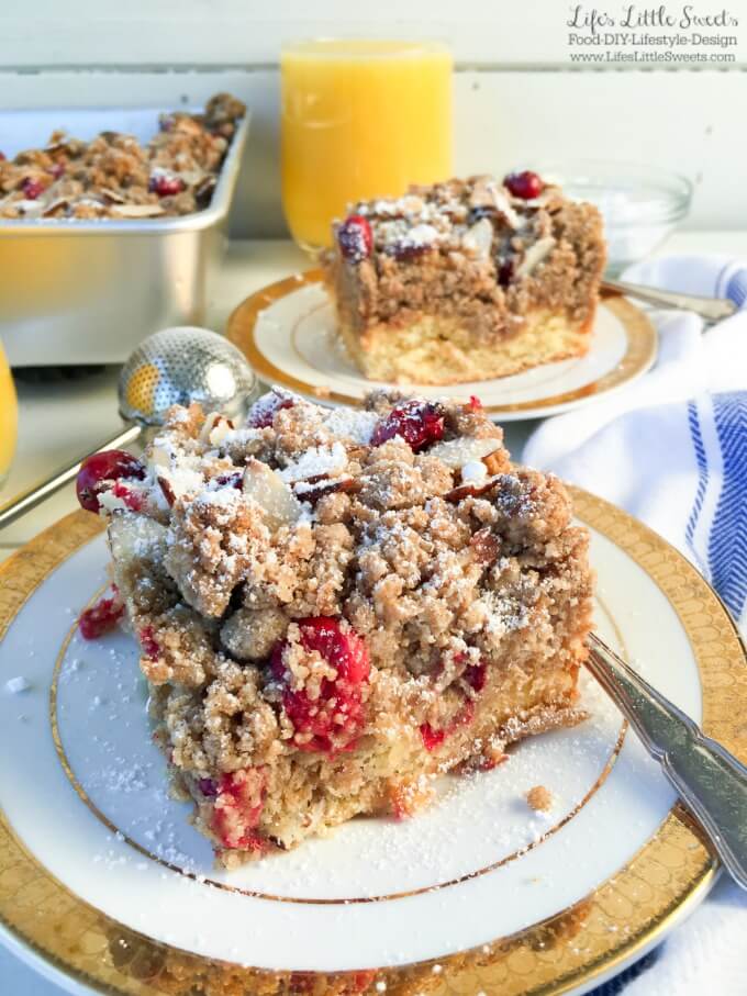 This Orange Cranberry Crumb Cake recipe is perfect for your Holiday or New Year's brunch! It is a dense, orange-flavored cake with a thick, top layer of crumb with tart, fresh cranberries and toasty, slivered almonds baked in. The orange-flavored cake gets it's delicious orange flavor from Minute Maid Orange Juice. #MinuteMaidHoliday #doingood #ad #CollectiveBias @MinuteMaid_US