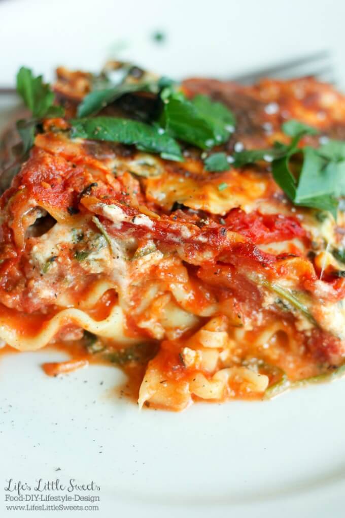 This Vegetarian Lasagna is packed with vegetables including sauteed baby spinach and Crimini (Baby Bella) mushrooms, grated zucchini and topped with Italian parsley. It also has ricotta and mozzarella cheese with oregano which adds to it's delicious flavor. Feed a crowd and feed your family with this hearty dish!