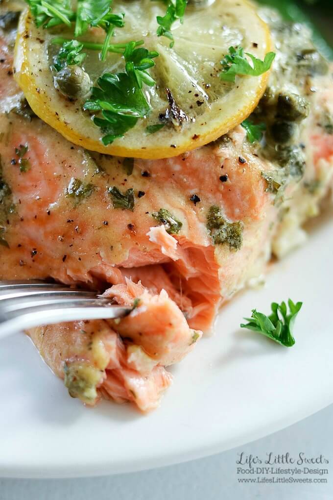 This Baked Dijon Lemon Caper Salmon Dinner is flavorful as it is delicious. Salmon lovers can rejoice with Dijon, lemon and caper flavor infused into melt-in-your mouth fillets of salmon. Served with roasted dill red potatoes and green beans, this dinner is sure to be a new family favorite! #salmon #greenbeans #potatoes #lemon #capers #Dijon #dinner #meal