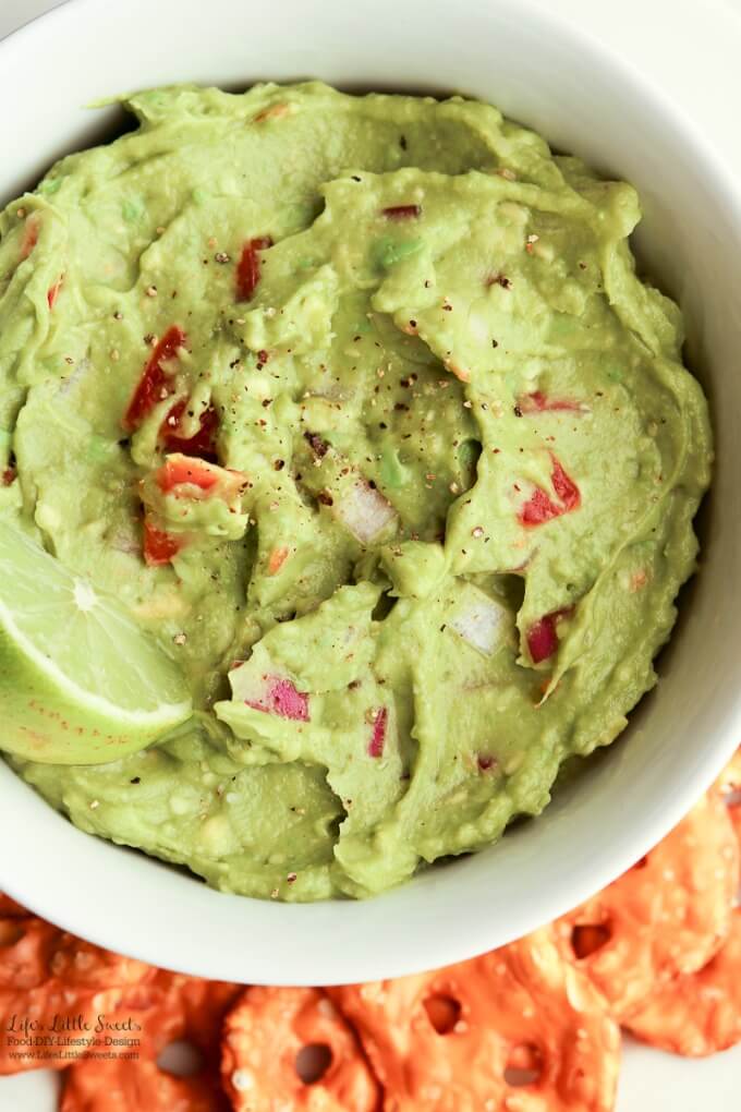 Bowl | This Easy Guacamole is fresh and a perfect recipe for Spring and Summer. A simple recipe with red onions, fresh chopped tomatoes and a spritz of lime, enjoy it for any gathering, game day or a quick snack for yourself!