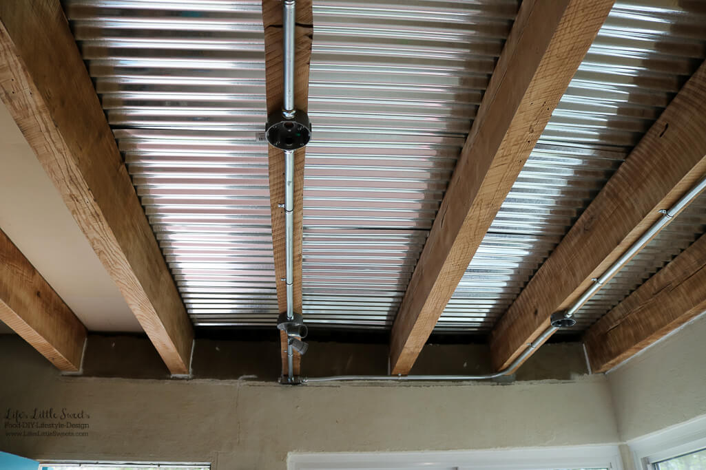 Sealed gaps along beams | Kitchen Renovation Ceiling Walls and Plumbing Update - Here's our latest update on the last 2 weeks for our modern, industrial Kitchen Renovation Project Series (45 photos!). www.LifesLittleSweets.com