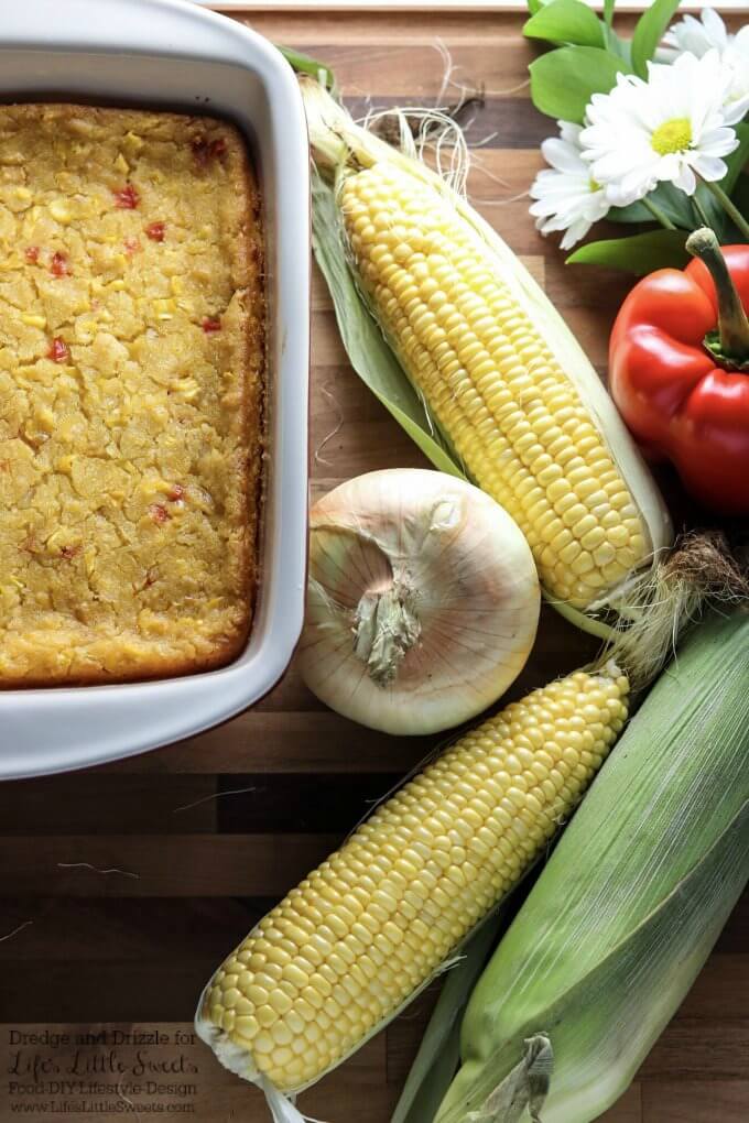 Perfect for corn Season! | If there were a non-traditional dessert you could eat right along with a meal, this Corn Soufflé would be it. It’s creamy and sweet and uses corn three ways; fresh corn right off the cob, creamed corn, and corn meal. Corn Soufflé is the perfect side dish to a cookout, weeknight dinner, or holiday meal. Little nuggets of onion and sweet red bell pepper give it even more fresh-from-the-garden flavors. Dredge and Drizzle for www.lifeslittlesweets.com 