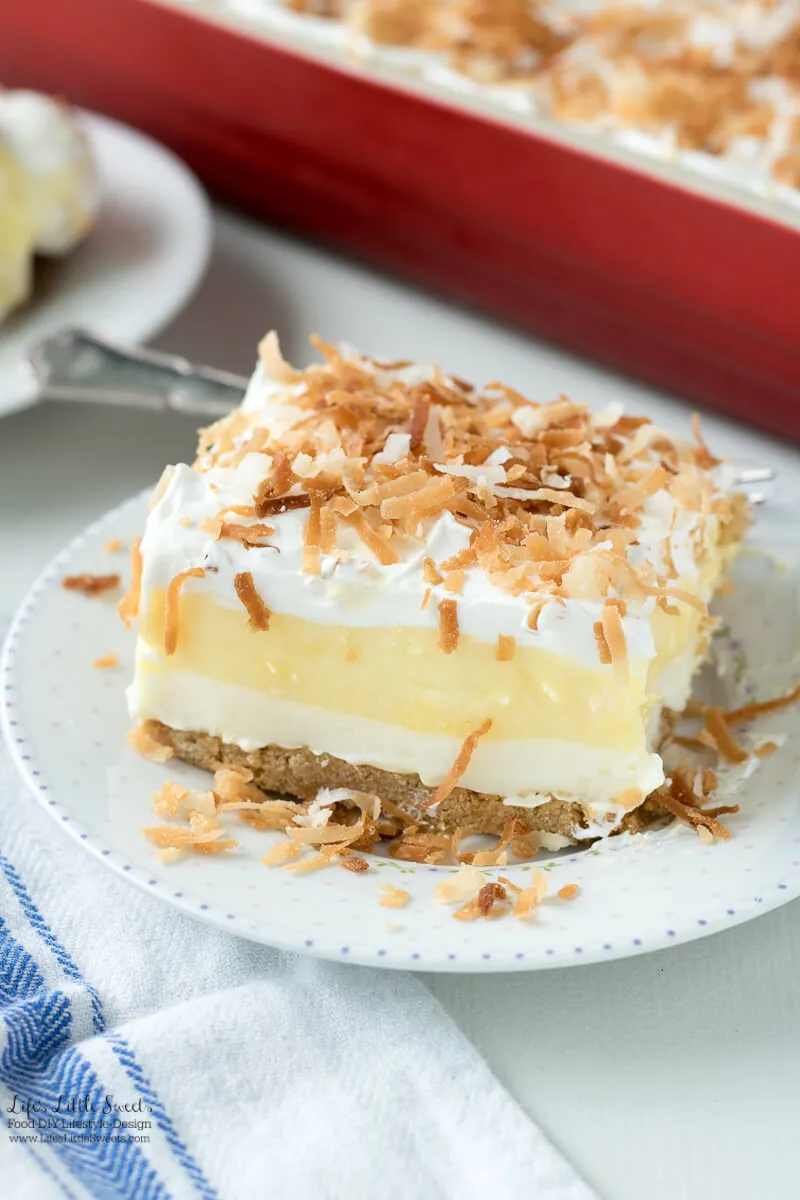 This Perfect Coconut Cream Lush Dessert Recipe recipe is light, creamy and filled with coconut deliciousness. It's a one-pan dessert that feeds a crowd and even has a no-bake crust option for those hot weather days.