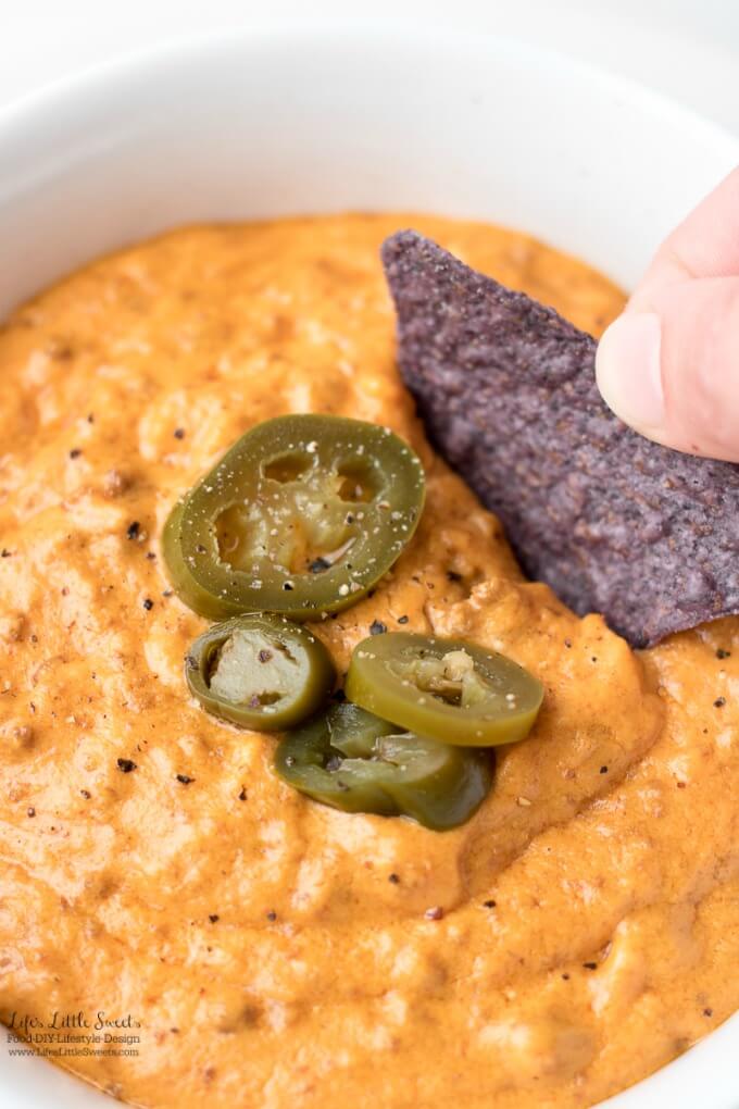 Dip with Chips | There are only 3 ingredients for this Slow Cooker Cheesy Queso Dip and it is so tasty and satisfying - perfect with your favorite tortilla chips. Make this simple queso recipe for a party or gathering and it's sure to be a crowd pleaser! #MySpringClean #TeamSponge #CollectiveBias #ad www.LifesLittleSweets.com