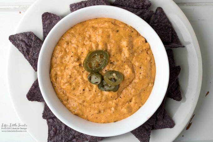Plated |There are only 3 ingredients for this Slow Cooker Cheesy Queso Dip and it is so tasty and satisfying - perfect with your favorite tortilla chips. Make this simple queso recipe for a party or gathering and it's sure to be a crowd pleaser! #MySpringClean #TeamSponge #CollectiveBias #ad www.LifesLittleSweets.com