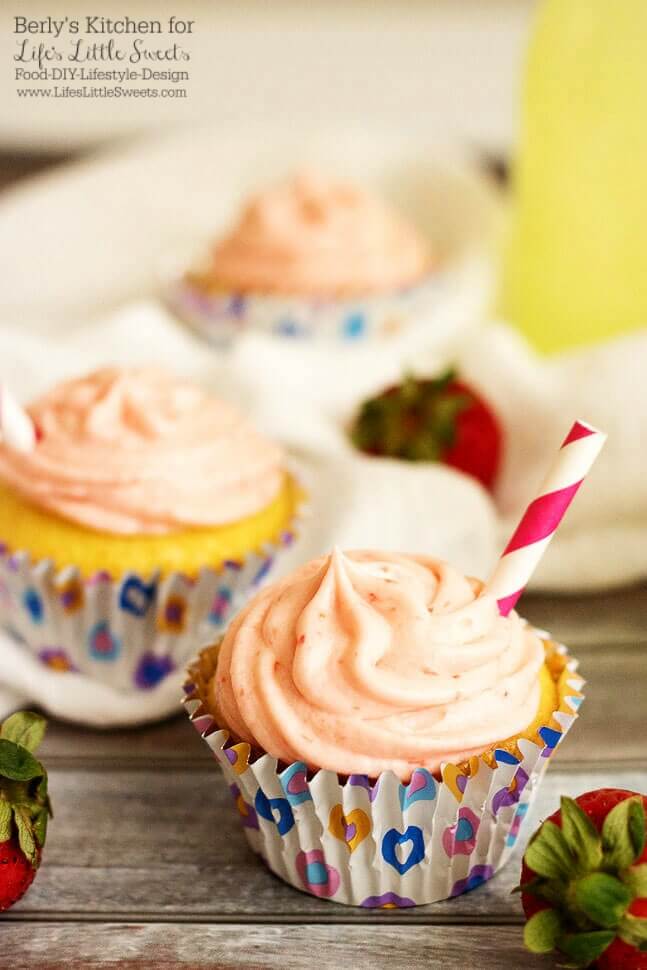 Two Strawberry Lemonade Cupcakes | Mother’s Day is almost upon us and what better way to show you care than to make something special for your amazing Mom? These Strawberry Lemonade Cupcakes are a semi-homemade but utterly delicious Mother’s Day treat full of tangy lemon and strawberry flavors.