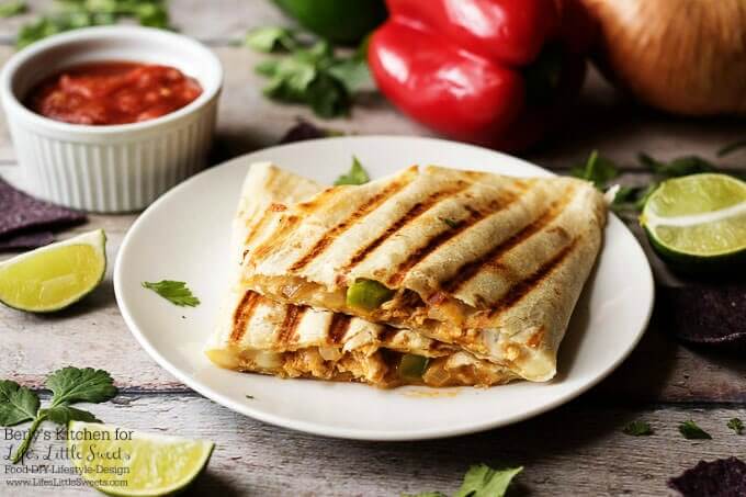 A great family meal! | Celebrate Fiesta Friday with these delicious grilled cheesy chicken fajita quesadillas. They are cooked to perfection and loaded with chicken and pepper jack cheese! www.lifeslittlesweets.com
