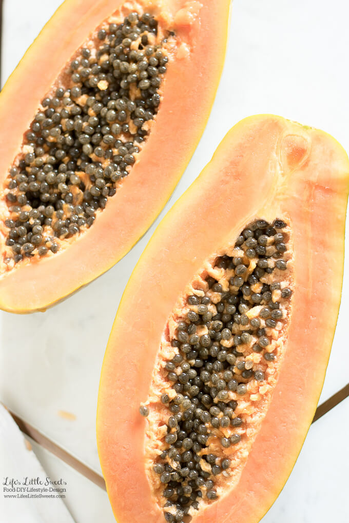 Sliced in half | Cottage Cheese Papaya is perfect for breakfast or a snack. Ripe, light and sweet papaya is paired with cottage cheese making an easy, healthy and filling breakfast. www.lifeslittlesweets.com