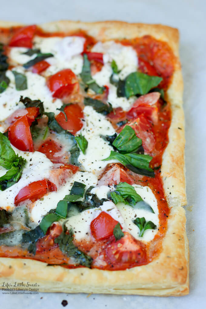 This Tomato Basil Mozzarella Puff Pastry Tart recipe is an easy, Summer-y and savory meal to make. No pizza dough making required! #pizza #tart #tomato #basil #puffpastry #recipe #Mozzarella #tomatosauce #caprese