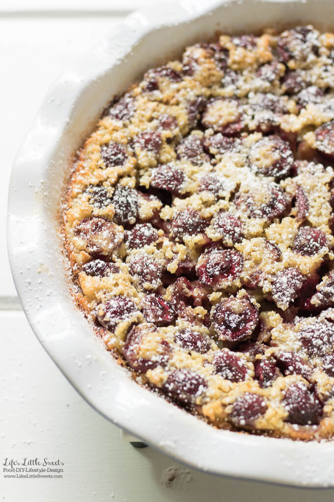 This Cherry Clafoutis Recipe is a baked, French dessert and the perfect way to serve up red cherries or your favorite stone fruit. Dusted with powdered sugar, it also goes nicely with whipped cream.