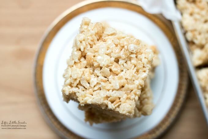 classic Rice Krispies Treats Recipe on a white and gold plate over a wood surface