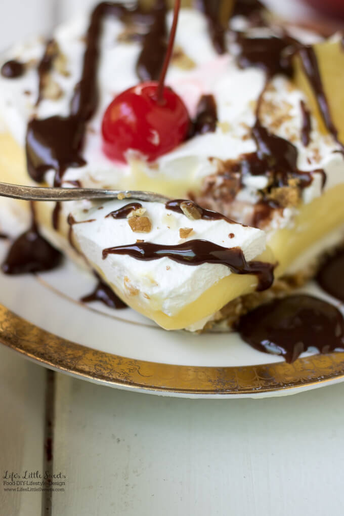 This Banana Split Lush Dessert Recipe is a Summer-y, light and sweet Banana Cream Lush dessert recipe topped with chocolate sauce, maraschino cherries and pineapple. Enjoy this delightful dessert at any Summer holiday, potluck or BBQ! (12 slices)