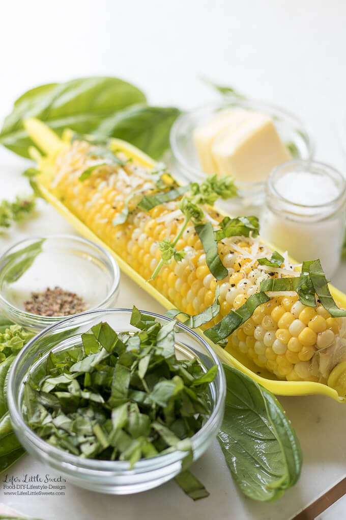 Basil Butter Corn is salty with sweet corn, fresh garden basil and sprinkled with shredded Parmesan cheese. The perfect Summer side dish!