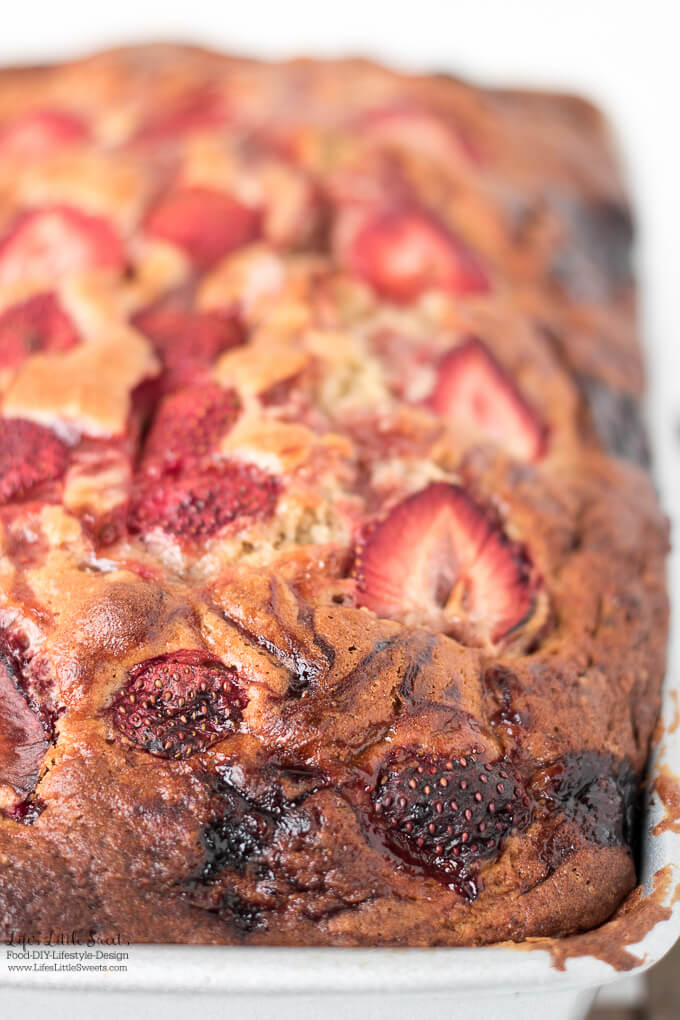 Peanut Butter and Jelly Strawberry Banana Bread is a sweet quick bread recipe which is a different take on the classic PB&J sandwich. It has a ribbon of Smucker’s® Strawberry jam and Jif® Peanut Butter baked inside! #ShopRitePBJLove #CollectiveBias #ad
