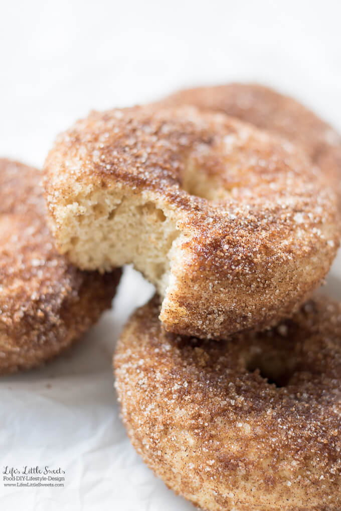 Baked Apple Cider Donuts are a delicious way to enjoy Fall. Infused with warm cinnamon and sweet apple cider, these classic donuts are also baked, not fried. #appleciderdonuts #nationaldonutday #donut #donuts #cinnamon #cinnamonsugar #applecider #doughnuts #baked #bakedappleciderdonuts