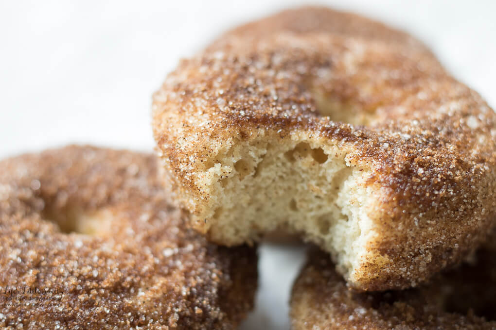 Baked Apple Cider Donuts are a delicious way to enjoy Fall. Infused with warm cinnamon and sweet apple cider, these classic donuts are also baked, not fried. #appleciderdonuts #nationaldonutday #donut #donuts #cinnamon #cinnamonsugar #applecider #doughnuts #baked #bakedappleciderdonuts