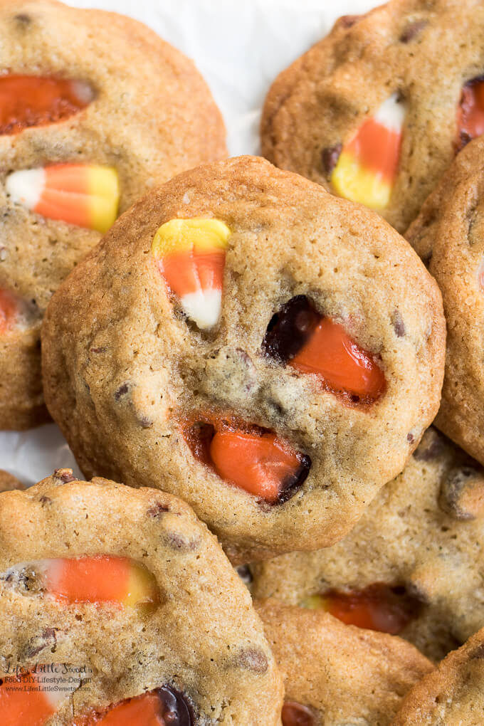 Candy Corn Chocolate Chip Cookies is a sweet and festive way to celebrate Halloween and Fall time - classic chocolate chip cookies topped with colorful candy corn. If you have a bunch of candy corn after the holidays this is a great way to use it up!