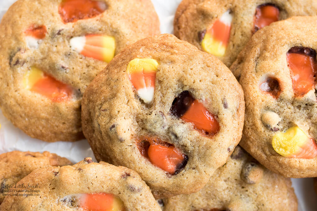 Candy Corn Chocolate Chip Cookies is a sweet and festive way to celebrate Halloween and Fall time - classic chocolate chip cookies topped with colorful candy corn. If you have a bunch of candy corn after the holidays this is a great way to use it up!