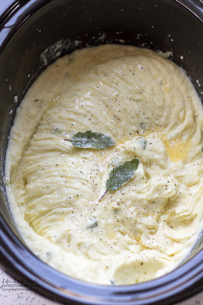 Perfect Sage Thyme Butter Whipped Potatoes are savory, full of flavor and a favorite on the Holiday table. Enjoy these creamy, butter-infused, whipped Yukon Gold potatoes at your meal! Keep them warm in a slow cooker for easy serving. #whipped #mashed #YukonGold #Thanksgiving #holiday #Christmas #slowcooker #potatoes #herb #sage #thyme #butter #creamy #cream #halfandhalf 