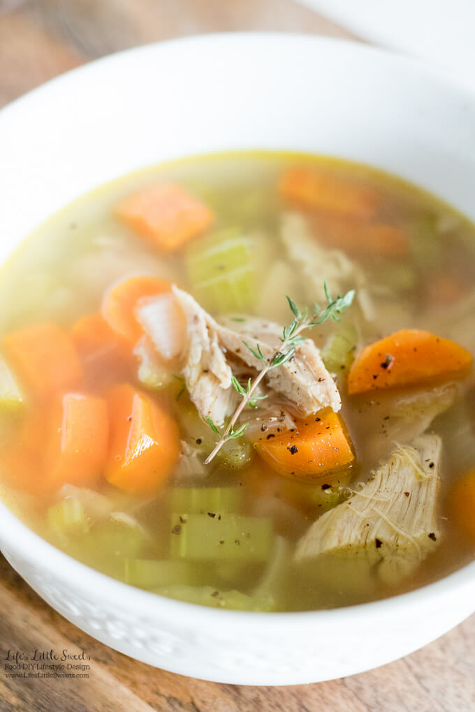 This nourishing Homemade Turkey Soup recipe can be made with leftovers from a Turkey dinner. You can make the broth from turkey leftovers, just add some veggies and turkey meat and you are all set for a delicious and savory soup! #thanksgivingleftovers #bonebroth #celery #carrots #soup #turkey #turkeymeat #broth
