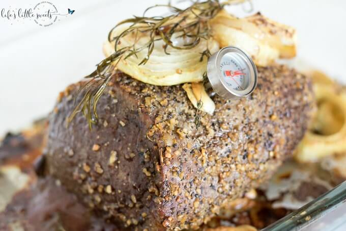 This Garlic Herb Eye of the Round Roast is a savory, flavorful and meaty main dish for the dinner table. This roast is seasoned with fresh herbs like thyme, rosemary and garlic, onions and Montreal Steak Seasoning. Easy to make for a weeknight or holiday dinner alike.  (gluten-free) #glutenfree #roast #eyeoftheround #thyme #rosemary #Montrealsteakseasoning #garlic