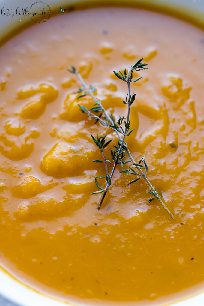 This Roasted Butternut Squash Soup is creamy, (without the cream!) savory and a delicious soup! The perfect way to enjoy butternut squash! (gluten-free, dairy-free, vegan) #butternutsquash #soup #roasted #vegan #glutenfree #dairyfree #vegan