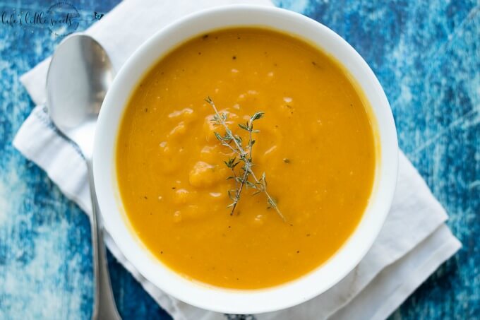 This Roasted Butternut Squash Soup is creamy, (without the cream!) savory and a delicious soup! The perfect way to enjoy butternut squash! (gluten-free, dairy-free, vegan) #butternutsquash #soup #roasted #vegan #glutenfree #dairyfree #vegan