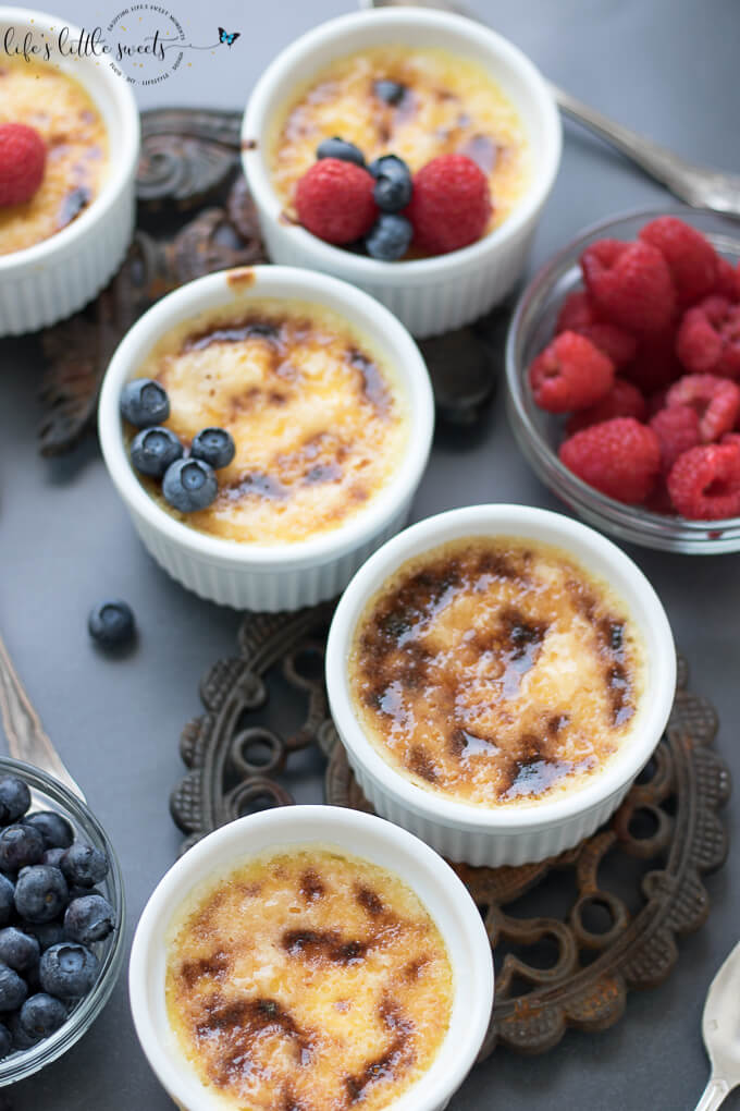 Crème Brûlée is a creamy egg and cream-based custard, infused with vanilla topped with a thin, crispy, sugar crust. Make this classic, French, 4-ingredient dessert for a decadent sweet treat. #cremebrulee #dessert #custard #fruit #berries