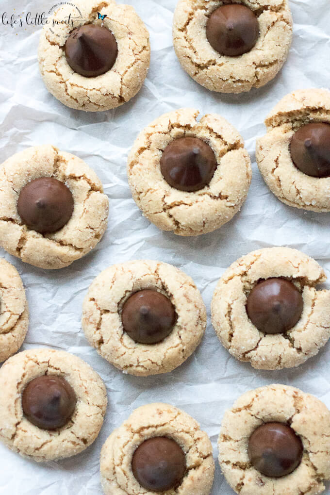 Peanut Butter Blossoms overhead view laying on parchment paper