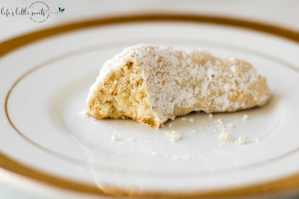 These Almond Crescent Cookies are classic, sugar-dusted cookies with buttery flavor and a crunchy texture from chopped almonds. #cookies #almond #almondcrescentcookies #christmascookies #holidaycookies #crescentcookies
