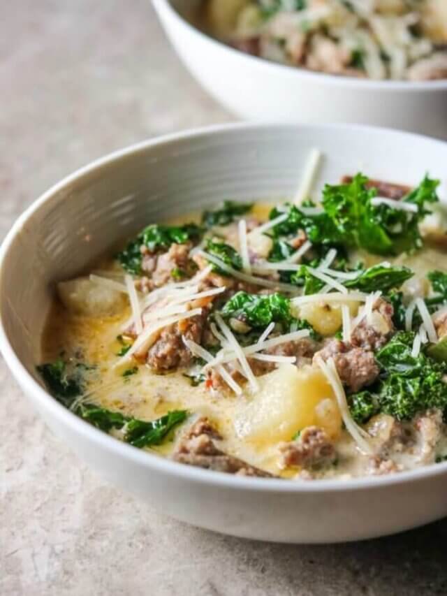 Homemade soup in a bowl with kale and cheese