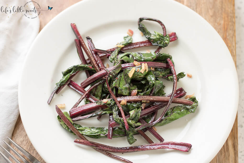 Sautéed Beet Greens are a colorful, savory and delicious addition to any meal. These greens are cooked with olive oil, garlic, salt and pepper. (1-2 servings, vegan, gluten-free) #beets #beetgreens #greens #garlic #oliveoil #Sautéed