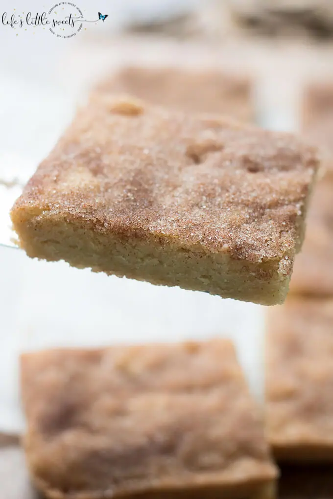 Snickerdoodle Cookie Bars have all the great, sweet taste of Perfect Snickerdoodle Cookies in a easy to prepare cookie bar. Topped with cinnamon sugar mixture, these bars have all the deliciousness of a snickerdoodle cookie. (makes 9 bars) #cookies #bars #cinnamon #snickerdoodles #snickerdoodle #sugar #Saigoncinnamon