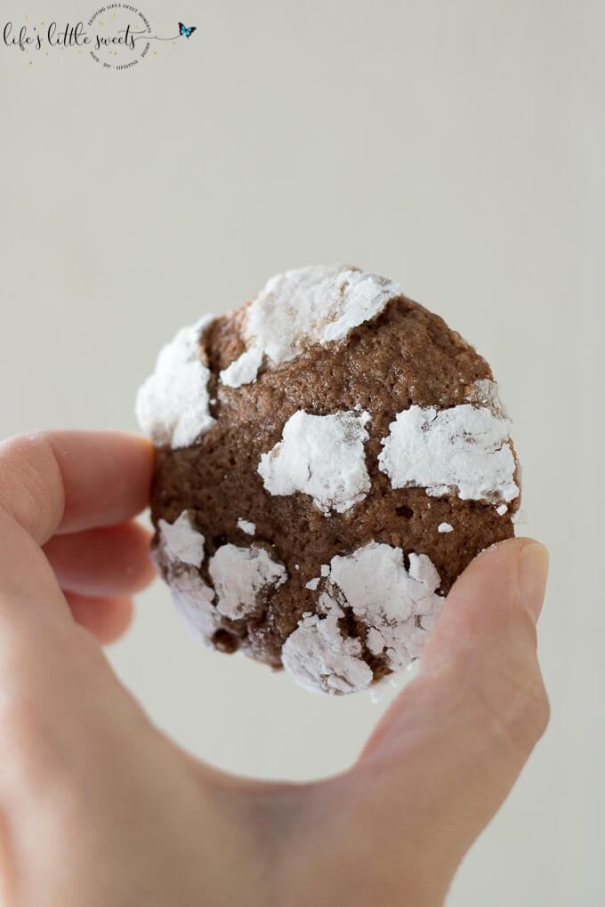 These Chocolate Crinkles have subtle chocolate flavor and just the right amount of chew. They are made with coconut oil and chocolate (unsweetened cocoa). #chocolate #chocolatecrinkles #cookies #coconutoil #unsweetenedcocoa #confectionerssugar