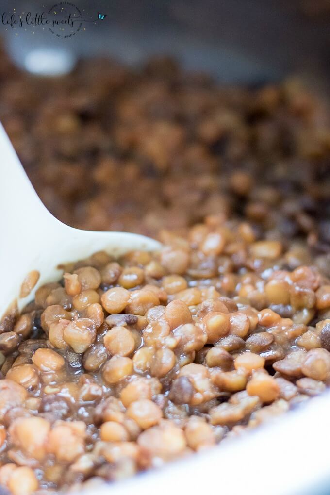 scooping cooked lentils from an instant pot