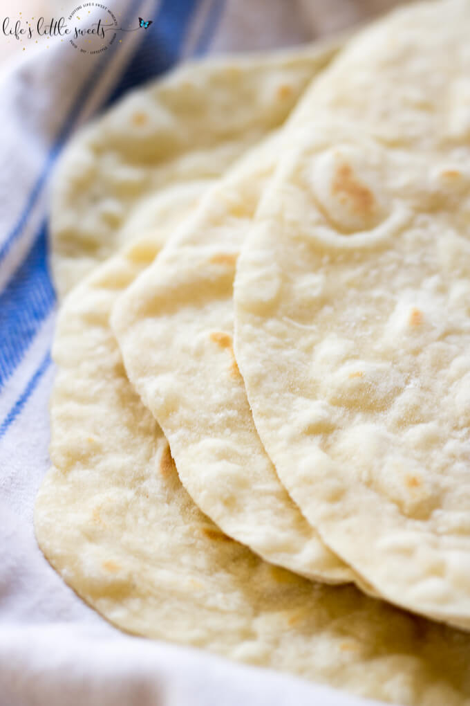 These Homemade Flour Tortillas are so wholesome and good; it's such a difference having homemade tortillas over store bought. They are perfect for wraps, dipping in sauces and to have with dinner. Only 5 ingredients! (vegan) #flour #homemade # coconutoil #vegan #vegetarian #tortillas
