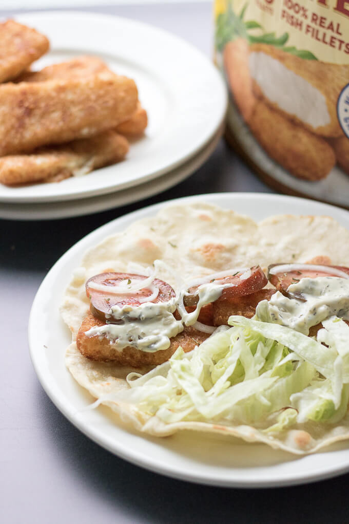 This Easy Beer Battered Fish Wrap has fresh ripe tomatoes, sliced onion, shaved Iceberg lettuce and Gorton's Beer Battered Fish Fillets - all wrapped up in a tortilla wrap. #GortonsMealTime #TrustGortons #CollectiveBias #ad @gortonsseafood