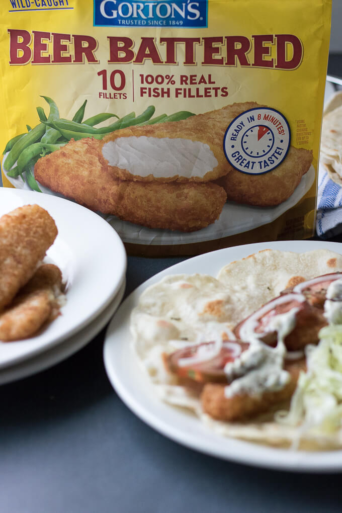 This Easy Beer Battered Fish Wrap has fresh ripe tomatoes, sliced onion, shaved Iceberg lettuce and Gorton's Beer Battered Fish Fillets - all wrapped up in a tortilla wrap. #GortonsMealTime #TrustGortons #CollectiveBias #ad @gortonsseafood